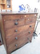 An inlaid 2 over 3 chest of drawers,