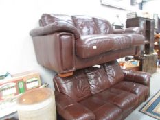 A pair of 3 seater brown leather sofa's