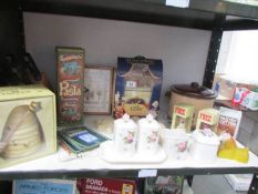 A shelf of miscellaneous including Beauty and the Beast butter dish,