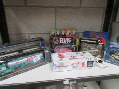 A shelf of boxed die cast models
