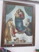 A Victorian oak framed print depicting Raphael's Maddona,