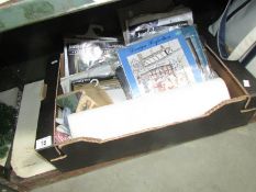 A box of assorted craft kits