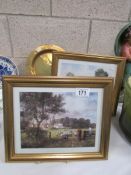 A pair of rural scene prints and a brass plaque