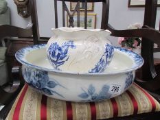 A blue and white wash basin and a jardiniere