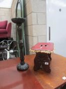 A stool and a wooden stand