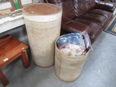 A large drum of knitting wool and another drum (empty)