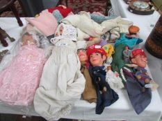 A quantity of vintage dolls and puppets