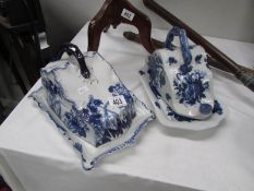 2 blue and white cheese dishes