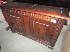 An oak panelled blanket box