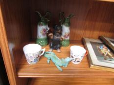 A pair of Victorian ewers, 2 teacups,