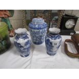 A blue and white ginger jar and 2 blue and white vases