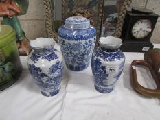 A blue and white ginger jar and 2 blue and white vases