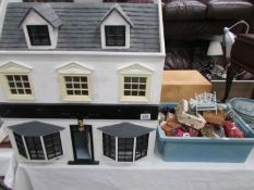 A dolls house and furniture