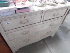 A painted chest of drawers
