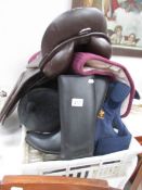 A quantity of horse riding accessories including saddle,