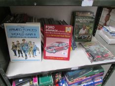 A shelf of motoring and other books