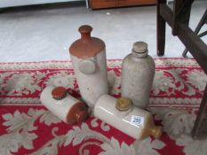 4 stoneware hot water bottles