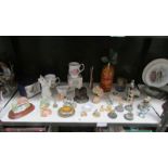 A mixed lot of pottery figurines,