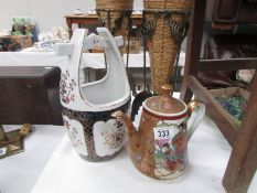 An oriental coffee pot and vase