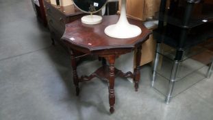 A mahogany occasional table