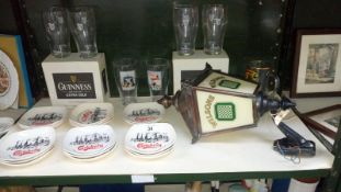 A mixed lot of brewery items including wall lantern