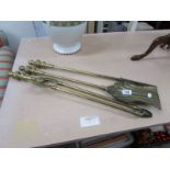 A set of 3 brass fire irons