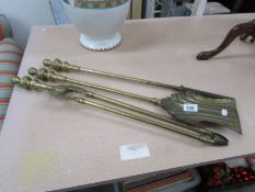 A set of 3 brass fire irons