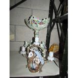 A continental porcelain table centrepiece and candelabra,