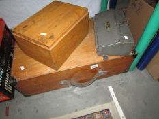 A wooden case and 2 other boxes