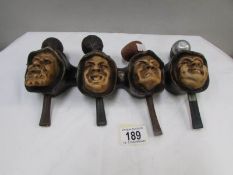 An unusual pipe rack with faces to front