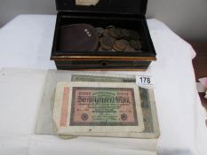 A cash box of coins,