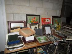 A large quantity of prints, picture frames,