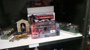 A quantity of models including Volkswagon van,