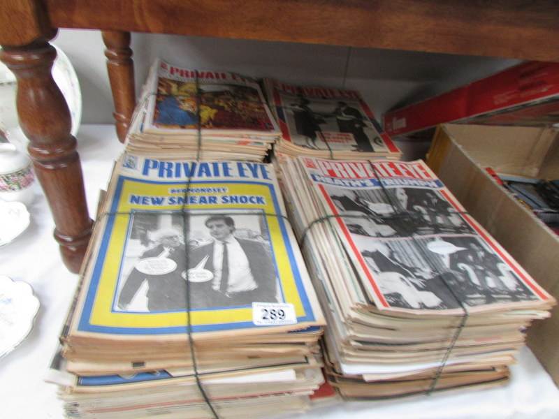 A collection of Private Eye magazines,