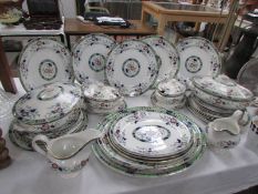 Approximately 30 pieces of dinner ware including tureens and meat platters