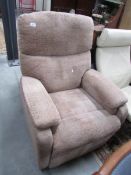 A recliner arm chair