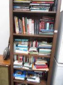 A large quantity of assorted books (all on book case)