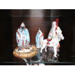 3 oriental figures,