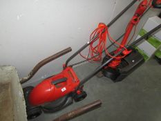 A lawn mower and a strimmer
