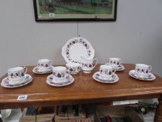 A 21 piece Paragon Michelle pattern tea set
