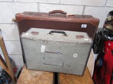 2 old suitcases