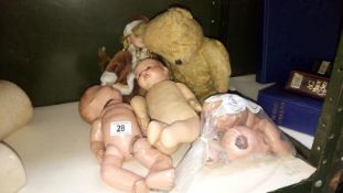 A quantity of vintage dolls and a teddy bear,