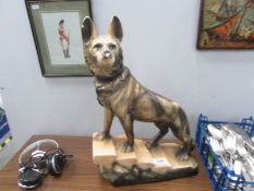 An art deco plaster figure of a dog