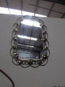A metal framed mirror