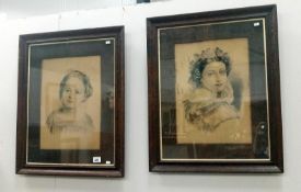 A pair of Victorian oak framed portraits