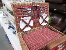 A picnic basket and contents