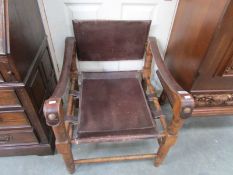 A wood and leather arm chair