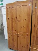 A pine 2 door wardrobe