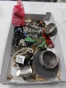 A mixed lot of costume jewellery including necklaces,