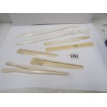 A quantity of ivory paperknives,